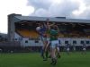 Damien challenegs for a ball in to the box