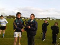 Ruair receives his skills winner award from Leo Heatley