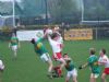 Dermot McCann leaps high to challenge in the air